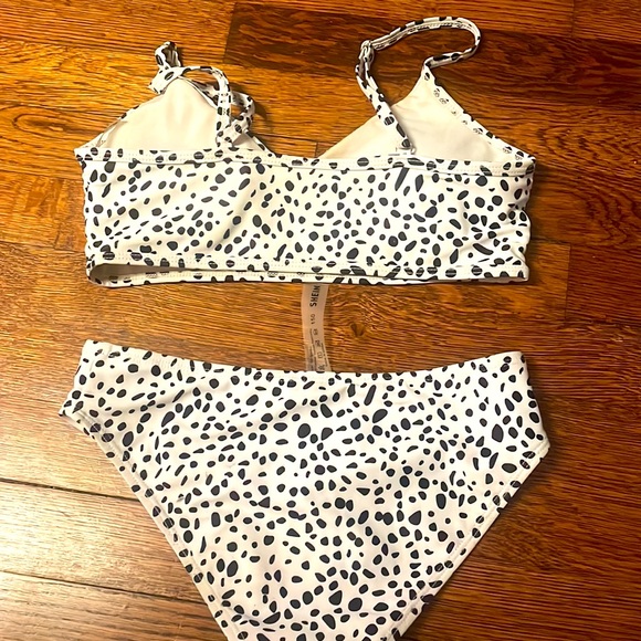 this is a shien barely worn baithing suit, the top is more worn the bottoms - Picture 2 of 2